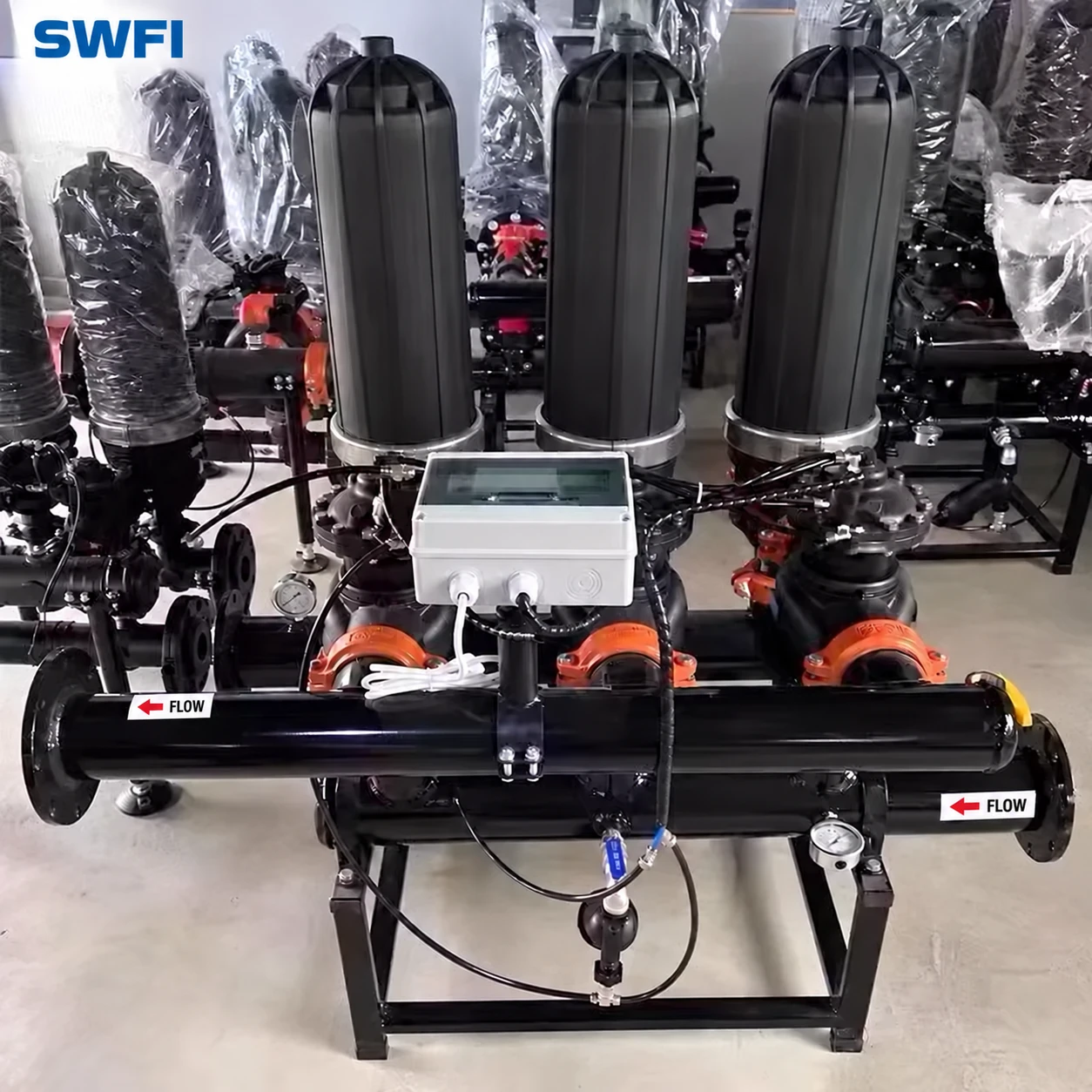 SWFI automatic disc filter system with three filter housings, controller and manifold