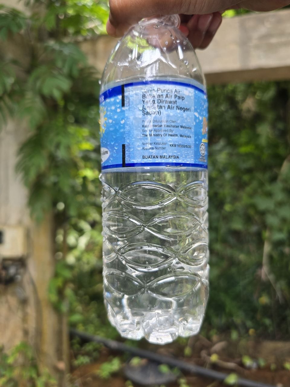 Clear treated-water sample after filtration at Nexus Resort
